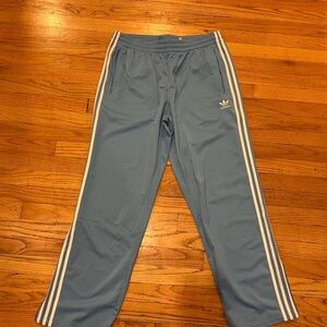 Adidas light blue track pants with white stripes - Size Large